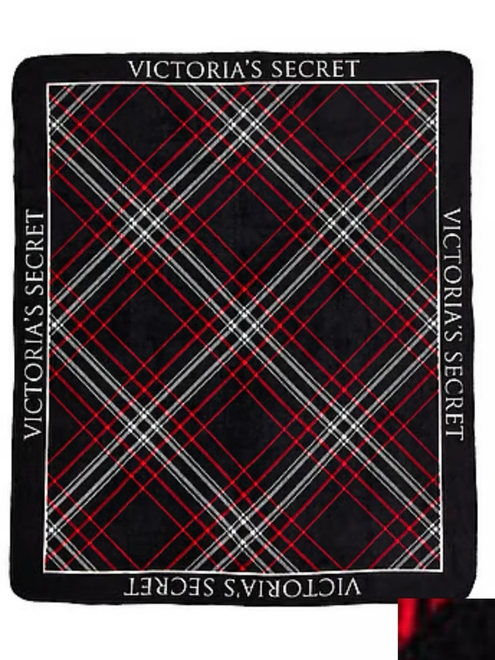 Victoria’s Secret Sherpa fleece blanket in plaid
